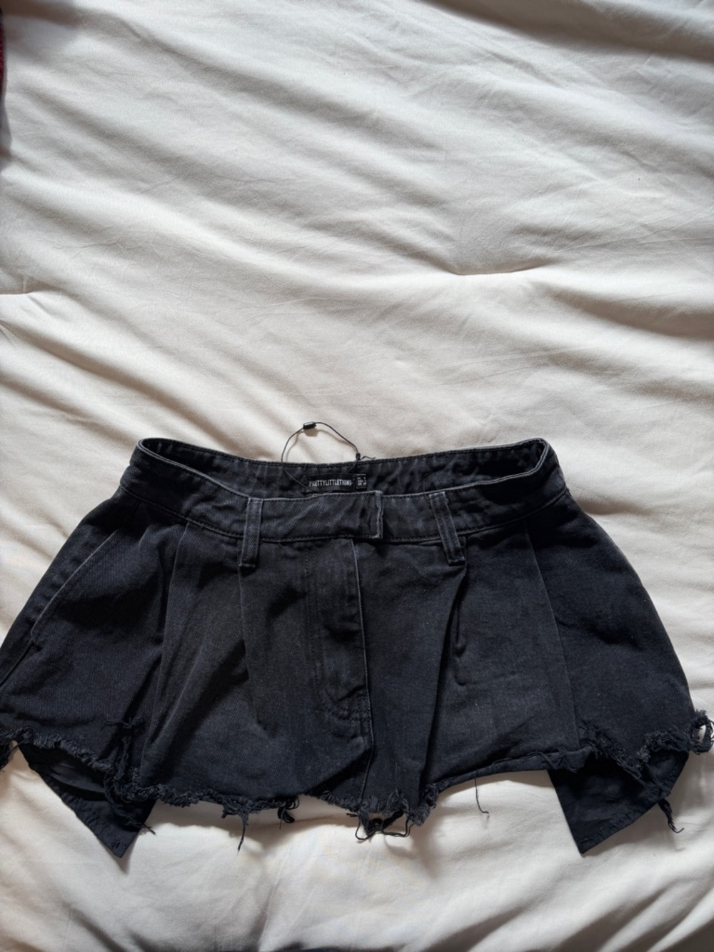 black distressed mini skirt